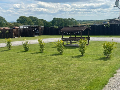 Landscaped lawns between pitches